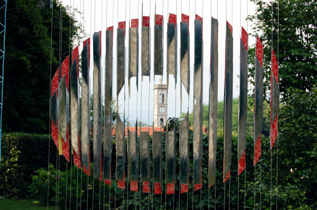 anamorphic, shape shifting, sculpture, landscape, garden, stainless, steel, geometric, abstract, Aspinall, art, Torre Canavese