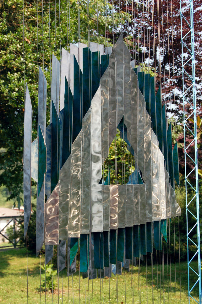 anamorphic, shape shifting, sculpture, landscape, garden, stainless, steel, geometric, abstract, Aspinall, art, Torre Canavese