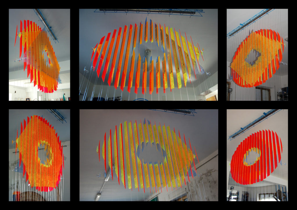 anamorphic, shape shifting, sculpture, acrylic, carved, coloured, geometric, abstract, Aspinall, art, rainbow, suspended