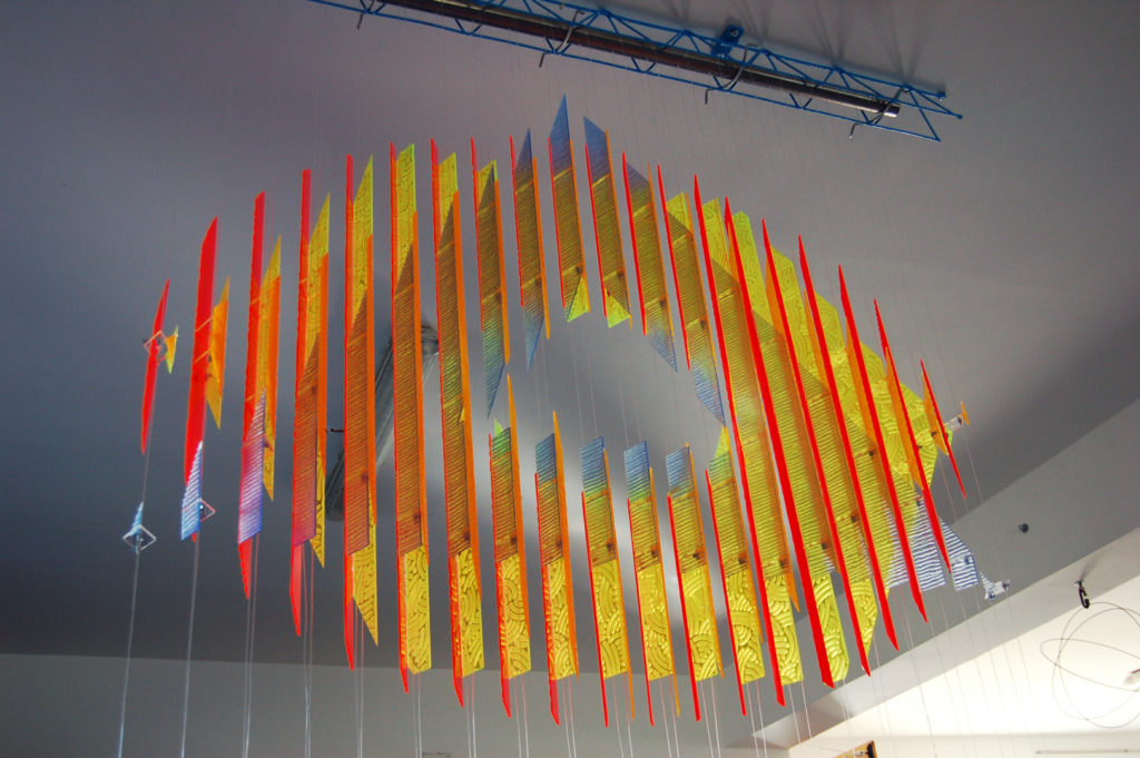 anamorphic, shape shifting, sculpture, acrylic, carved, coloured, geometric, abstract, Aspinall, art, rainbow, suspended