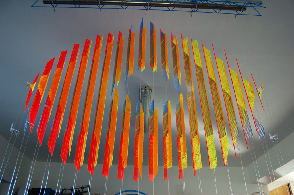 anamorphic, shape shifting, sculpture, acrylic, carved, coloured, geometric, abstract, Aspinall, art, rainbow, suspended