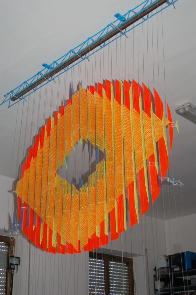 anamorphic, shape shifting, sculpture, acrylic, carved, coloured, geometric, abstract, Aspinall, art, rainbow, suspended