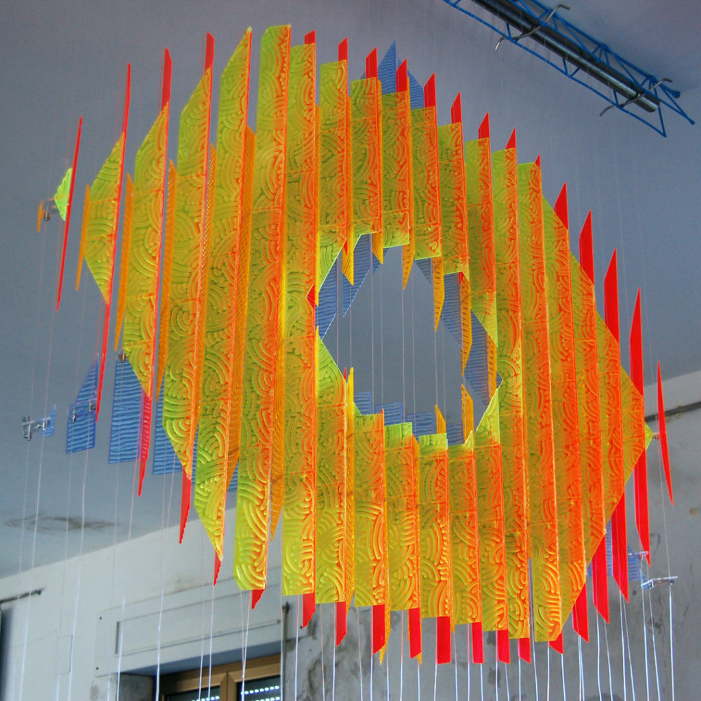 anamorphic, shape shifting, sculpture, acrylic, carved, coloured, geometric, abstract, Aspinall, art, rainbow, suspended