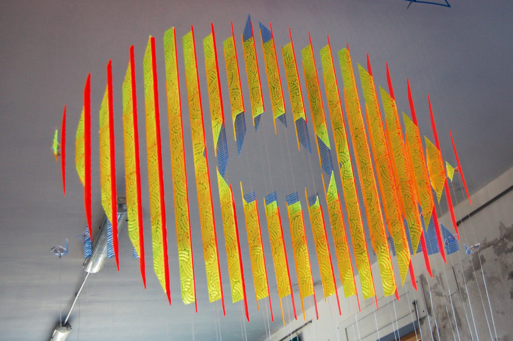 anamorphic, shape shifting, sculpture, acrylic, carved, coloured, geometric, abstract, Aspinall, art, rainbow, suspended